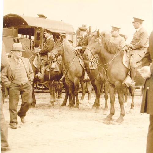 [Police officers on horses standing by during Strike]