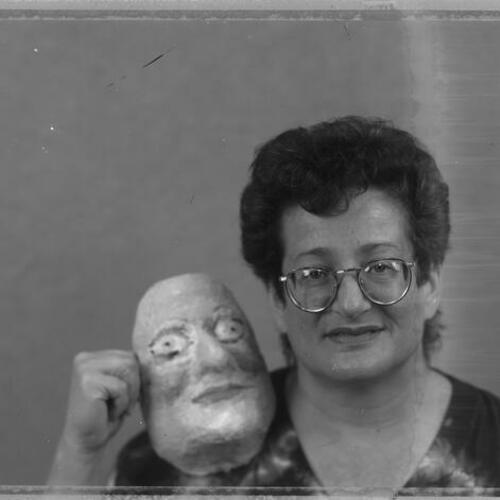 Carol with plaster face mask, The Center for AIDS Services (Oakland, California)