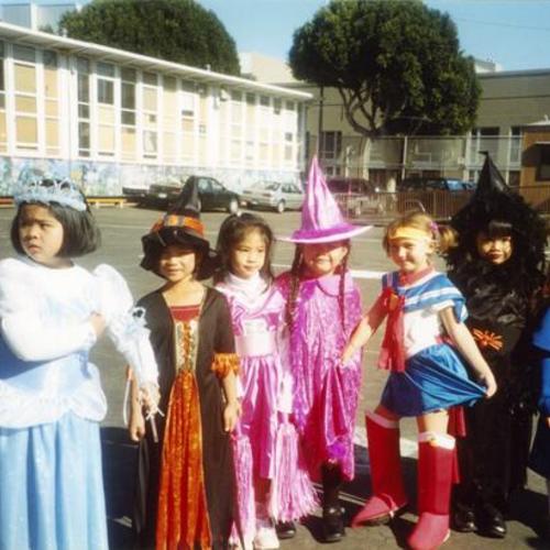 [Students from Bessie Carmichael Elementary School dressed up in costumes for Halloween]
