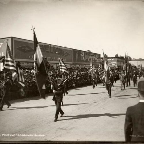 [Men on foot carrying flags, Parade from Portola Festival, October 19-23, 1909]