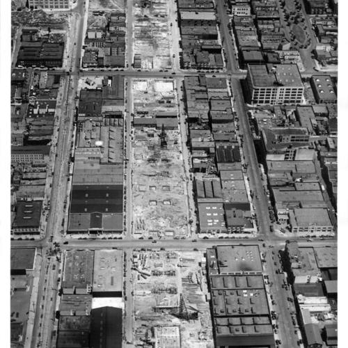 [Aerial view of path of demolished buildings along San Francisco Bay Bridge approach]