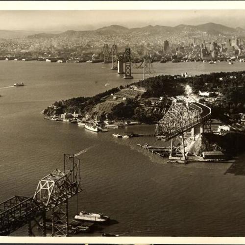 [Aerial view of San Francisco-Oakland Bay Bridge progressively linking San Francisco and Yerba Buena Island]
