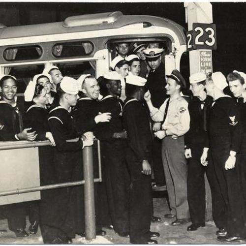 [Sailors at the Seventh Street Pacific Greyhound bus depot shortly before a bus drivers' strike]