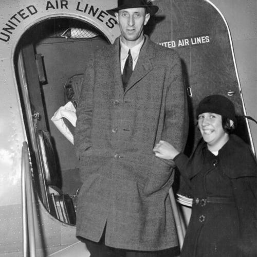 [Harry Bridges being welcomed by daughter Betty on his arrival at San Francisco airport]