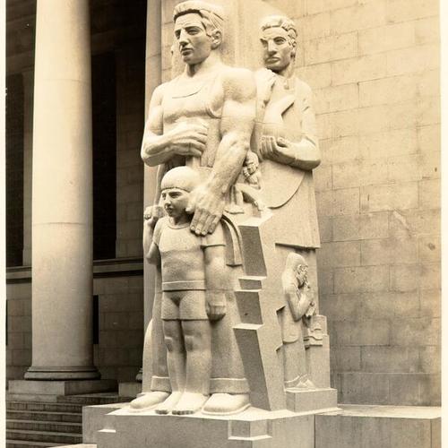 [Ralph Stackpoles' sculptured figure of men flanks the exterior of the Stock Exchange]
