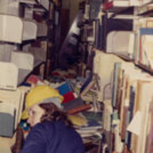 [Fallen bookshelves at Main Library after 1989 Earthquake]