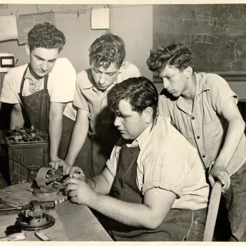 [James Albee, Louis Di Marco, Anthony Marino and Tezeo Masini in an Electric Shop class at Marina Junior High School]