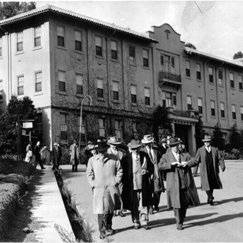 [San Francisco civic and civil leaders inspect Angel Island's Fort McDowell's hospital]