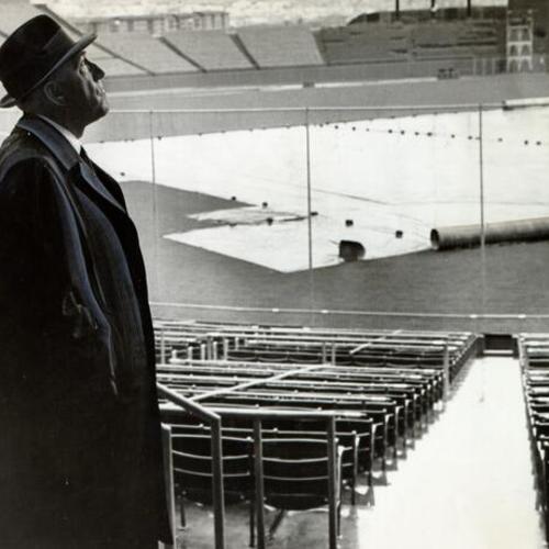 [Commissioner Ford Frick inspecting Candlestick Park's field]