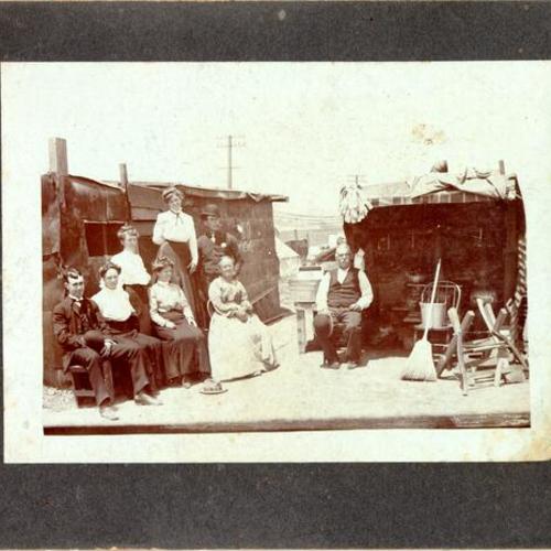 [James Fogarty family posing at their street kitchen at 16th and Bryant streets]