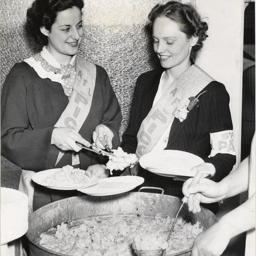 [Marietta Frain and Kathleen Jacobson serving food in a soup kitchen for striking 5 & 10 cent store workers]