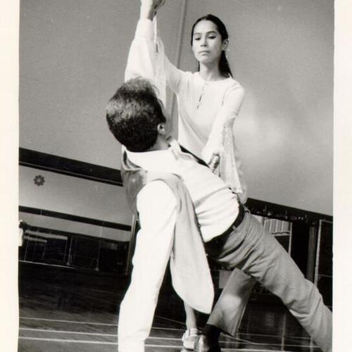 [Students Nina Ramos and Tony Escobar practicing a dance performance at Mission High School]