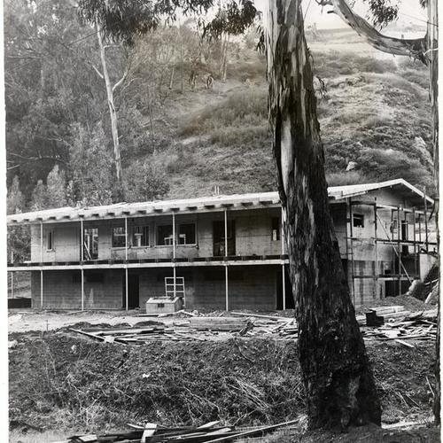 [Construction of a two-story clubhouse in Glen Canyon]