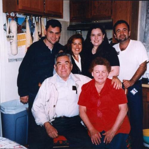 [Maricela and her family at home]