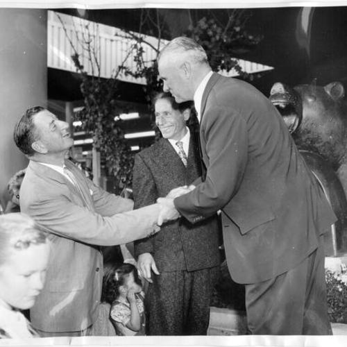 [Beniamino Bufano, with Lt. Governor Harold J. Powers and developer David D. Bohannon, attends unveiling of 11 of his statues at San Mateo's Hillsdale Shopping Center]