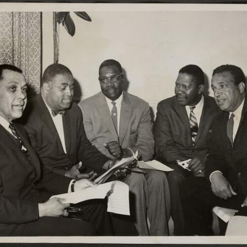 Dr. Hamilton T. Boswell, William Chester, Reverend G. L. Bedford, Henry Freeman Jr. and Revels Cayton (left to right) at 2121 Sutter Street press conference