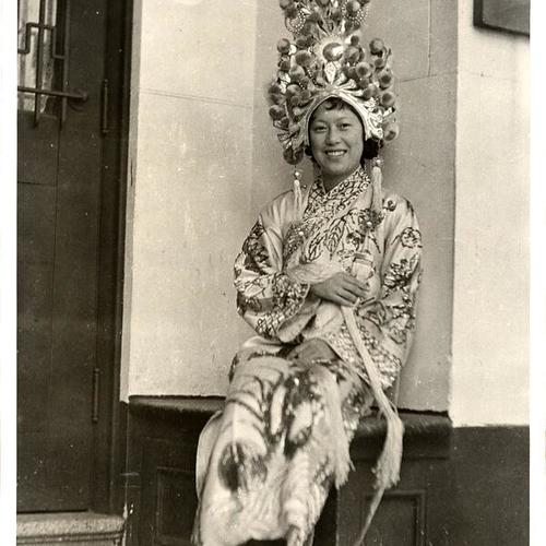 [Yik Mun, as she's known in Chinatown, or Helen Fong, as she's known at the University of California, dressed in costume at the Chinese jade Festival]
