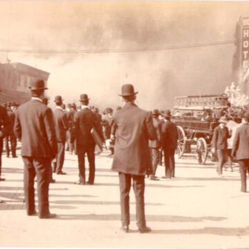 [Crowd of people watching a fire on Market Street]