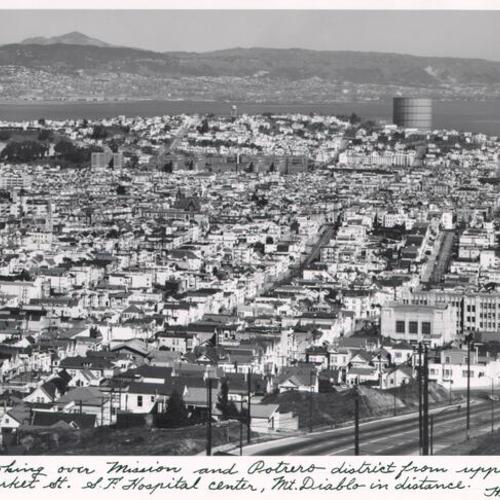 Looking over Mission and Potrero district from upper Market St. S.F. Hospital center, Mt. Diablo in distance