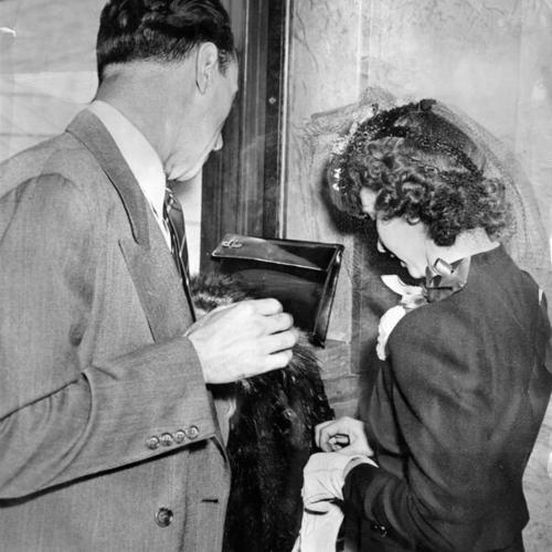 [Harry Bridges and Miss Jeannine Lowry, witness in the Harry Bridges deportation trial]