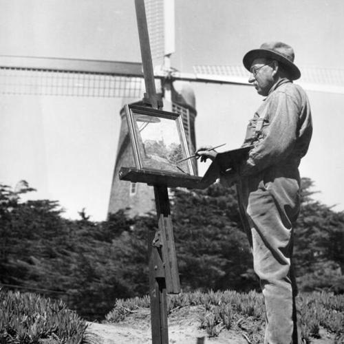 [H. Hammerstrom painting a picture of windmill in Golden Gate Park]