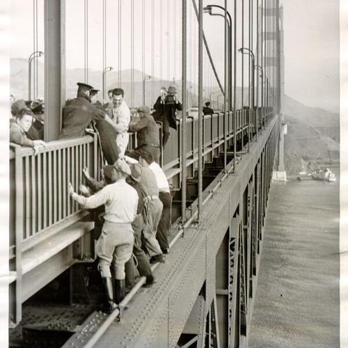 [John L. Evans being rescued after he tried to commit suicide on the Golden Gate Bridge]