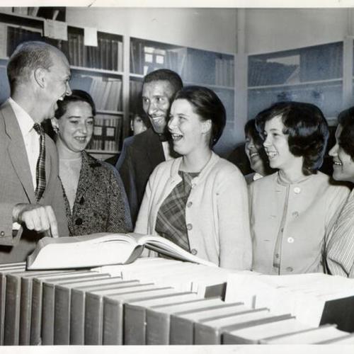 [Dr. Chester Herrod speaking to a group of students from Balboa High School at the Presbyterian Medical Center's medical library]
