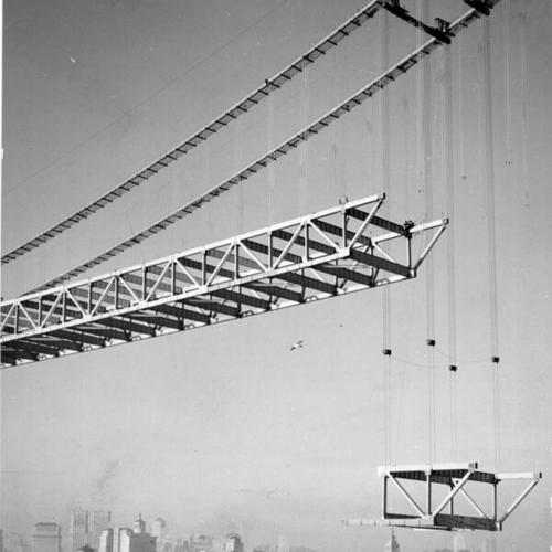[Truss section of Bay Bridge is raised into position]
