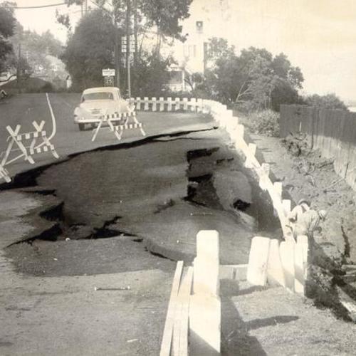 [Work crew fixing a road leading from Sausalito to the Golden Gate Bridge that was damaged in a storm]