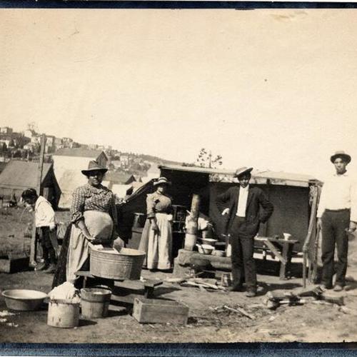 [Refugees washing their laundry at Gough and Green Street]