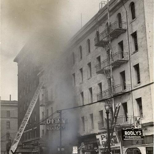 [Firemen fighting a four-alarm fire at a hotel on Third and Howard streets]