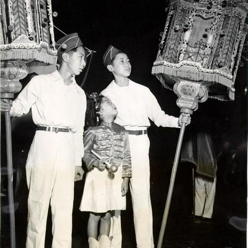 [Herbert Jung, Ella Tom and Weyman Chung during the Portola Festival and Pageant in Chinatown]