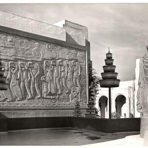 [Cambodian-inspired relief mural 'Path of Darkness' by artist Lulu H. Braghetta in the Court of Pacifica, Golden Gate International Exposition on Treasure Island]
