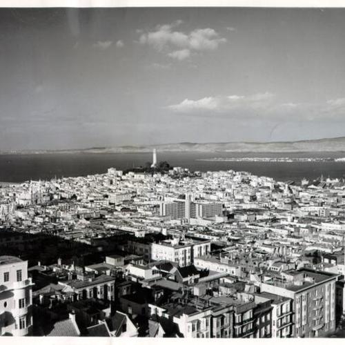 [View of San Francisco from 18th floor of apartment building at 1200 California Street, facing northeast with Coit Tower in center and Treasure Island in distance]