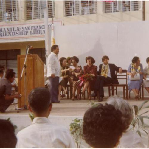 [Dianne Feinstein seated in front of Manila-San Francisco Friendship Library.]