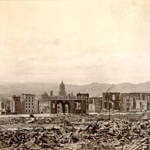 [View of earthquake and fire damage from Pine Street, between Taylor and Mason]