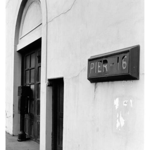 [Close up view of the entrance and sign for Pier 16]