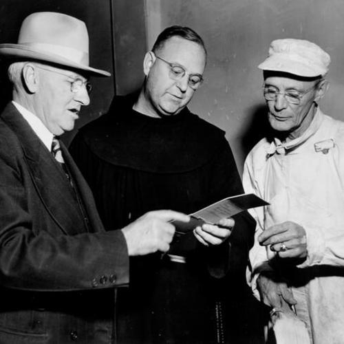 [Father Alfred Boeddeker, with Ed Jones and Frank Duxbury]