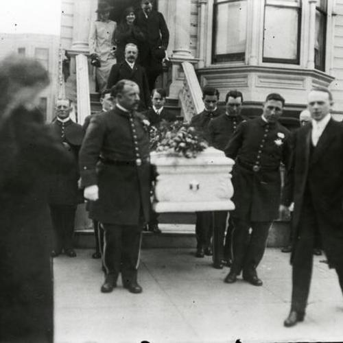 [Funeral of policeman Edward Maloney leaving funeral parlor on Valencia Street]