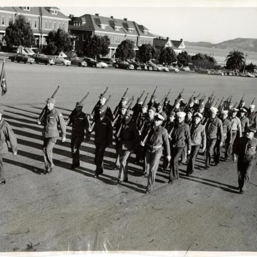 [Army and Navy students at the joint Military Police School at the Presidio of San Francisco receiving instructions in close order drill]