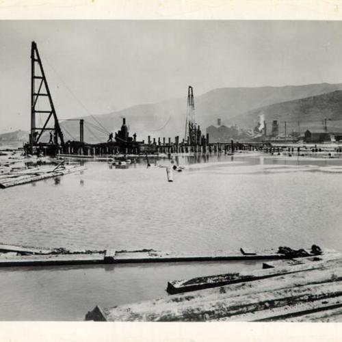 [Laying foundation in freight yards of Southern Pacific, Visitacion Valley]