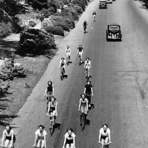 [Group of women bicycling in Golden Gate Park]
