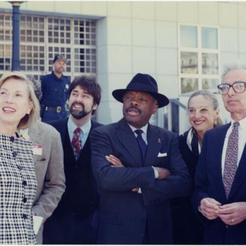 Charlotte Mailliard Shultz, Willie Brown, Cathy Simon, and James Ingo Freed (rear, right) outside Main Library on Fulton Street