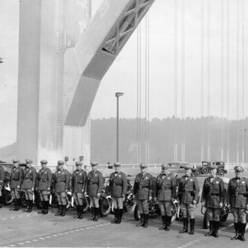 [California Highway patrol officers pose on Bay Bridge prior to opening]