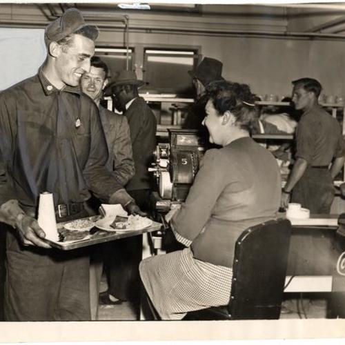 [Workers at Hunters Point Naval Shipyard in the employee cafeteria]
