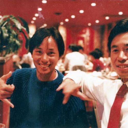 [Two brothers at sister's wedding at Tong Palace restaurant on Clement Street]