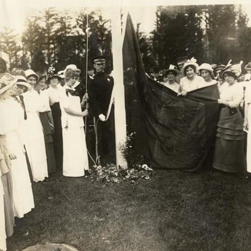[Women holding flag at groundbreaking ceremony for the Y.W.C.A. building]