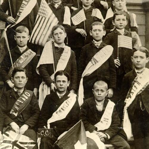 [Group of students from St. Rose Parish School posing with American flags]