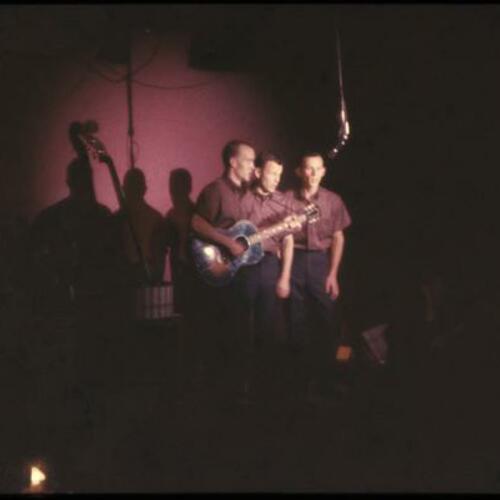 Smothers Brothers performing on stage at the Purple Onion
