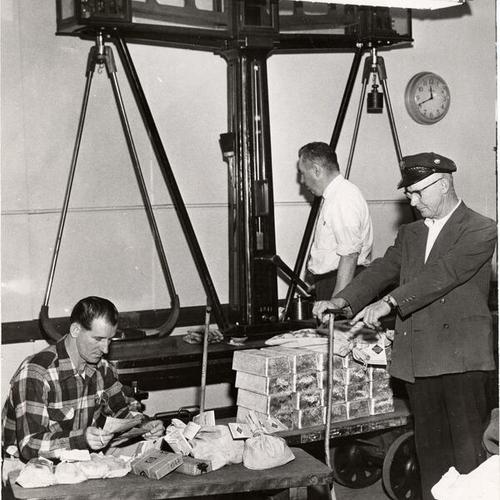 [Workers receiving gold and silver bullion at the U. S. Mint in San Francisco]